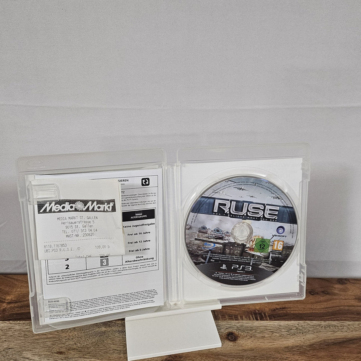 R.U.S.E. für PlayStation 3 – geöffnete Hülle mit Disc und beiliegendem Zettel