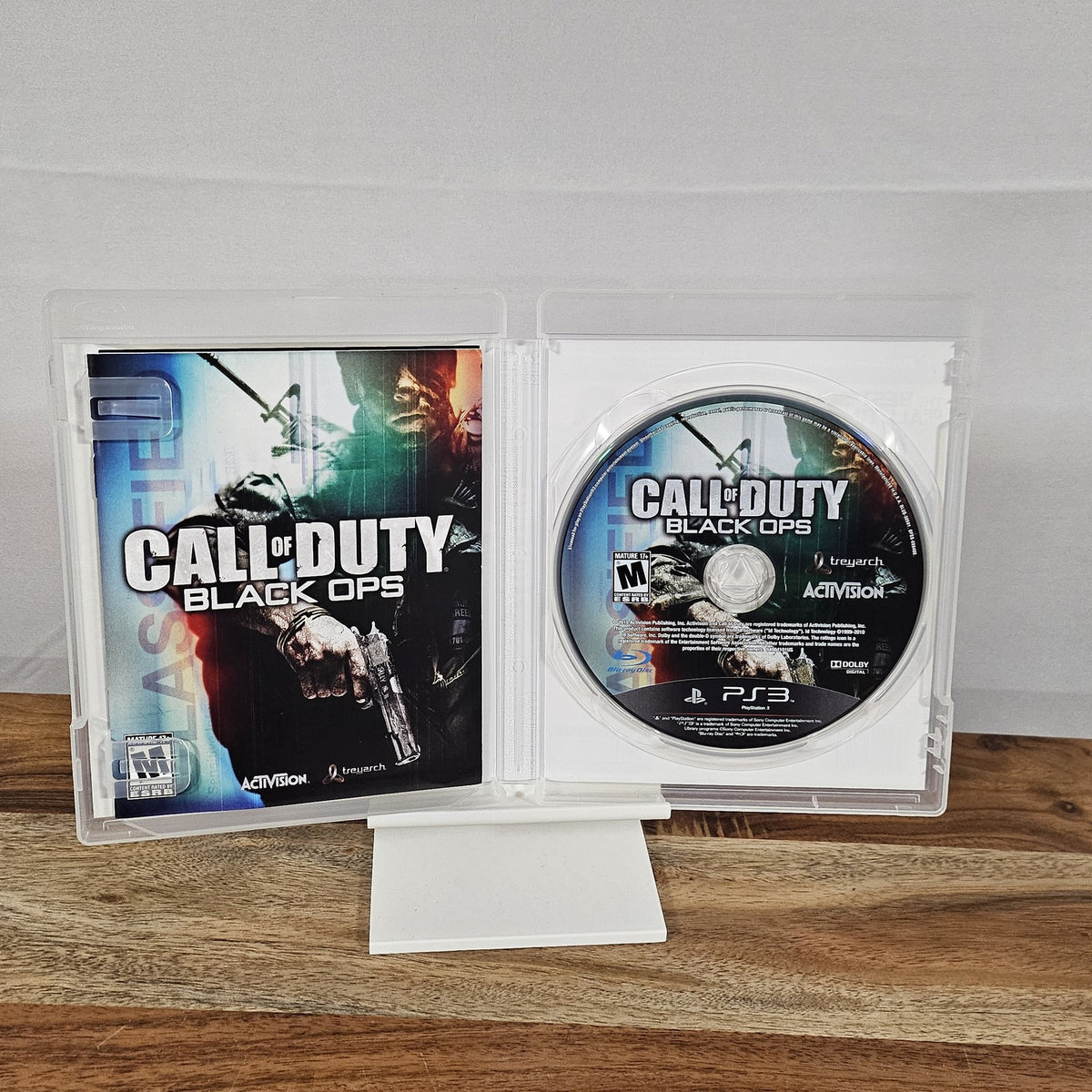 Call of Duty: Black Ops US-Version für PlayStation 3 – geöffnete Originalhülle mit Spiel-Disc und Unterlagen