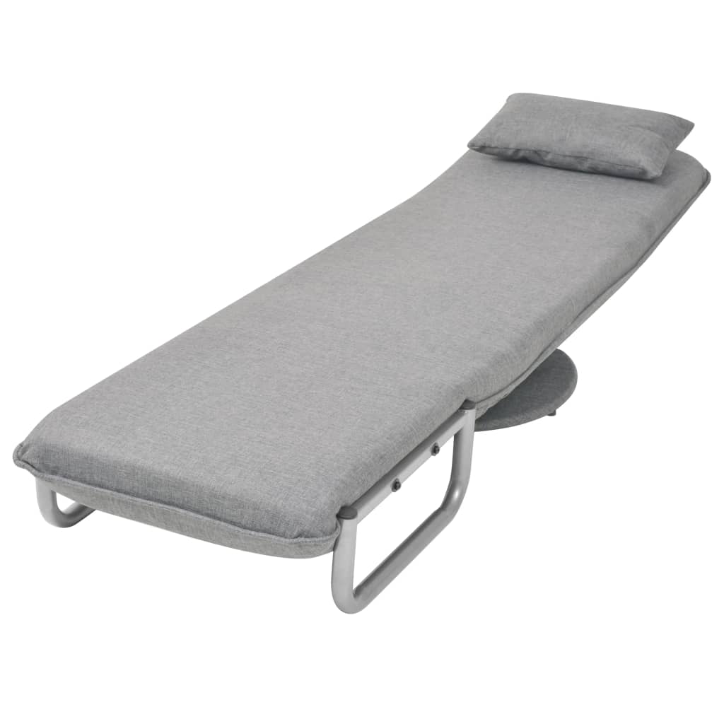 Fauteuil pivotant et canapé-lit en tissu gris clair