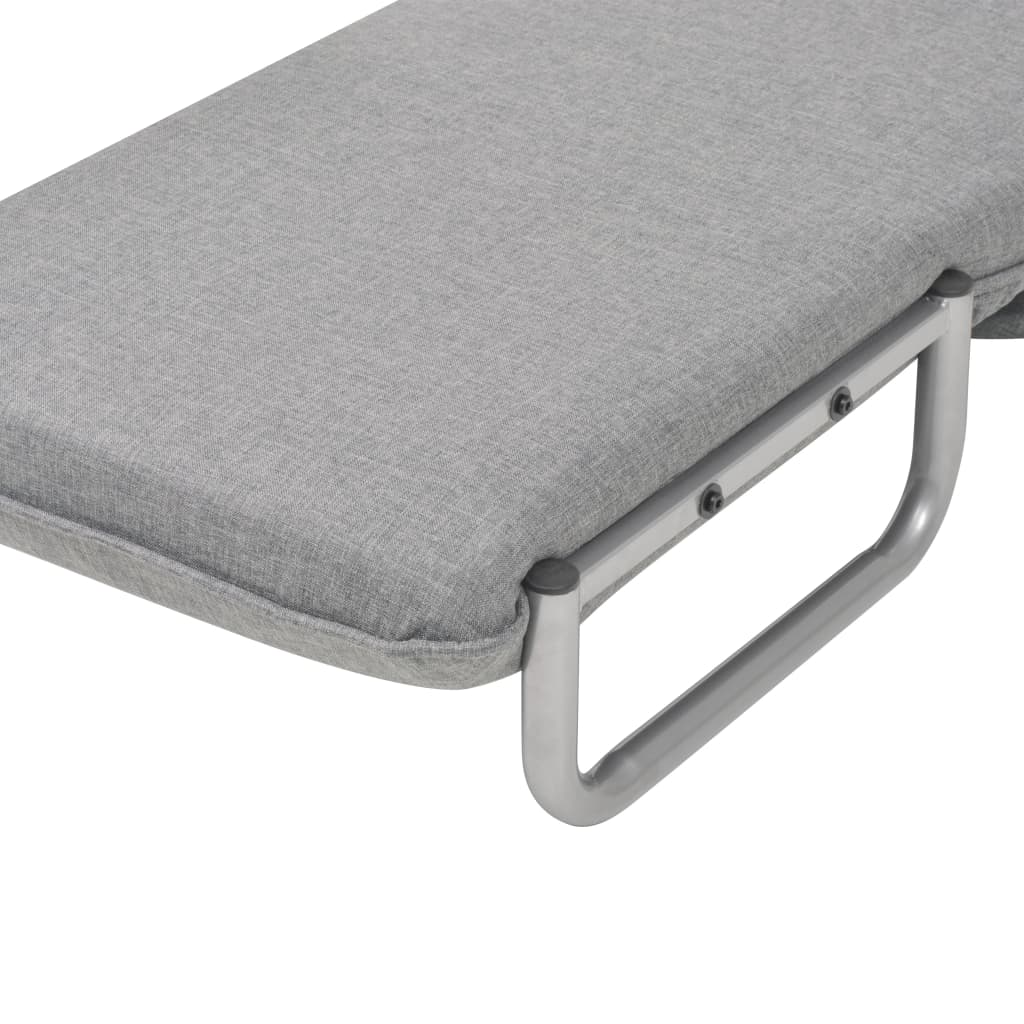 Fauteuil pivotant et canapé-lit en tissu gris clair