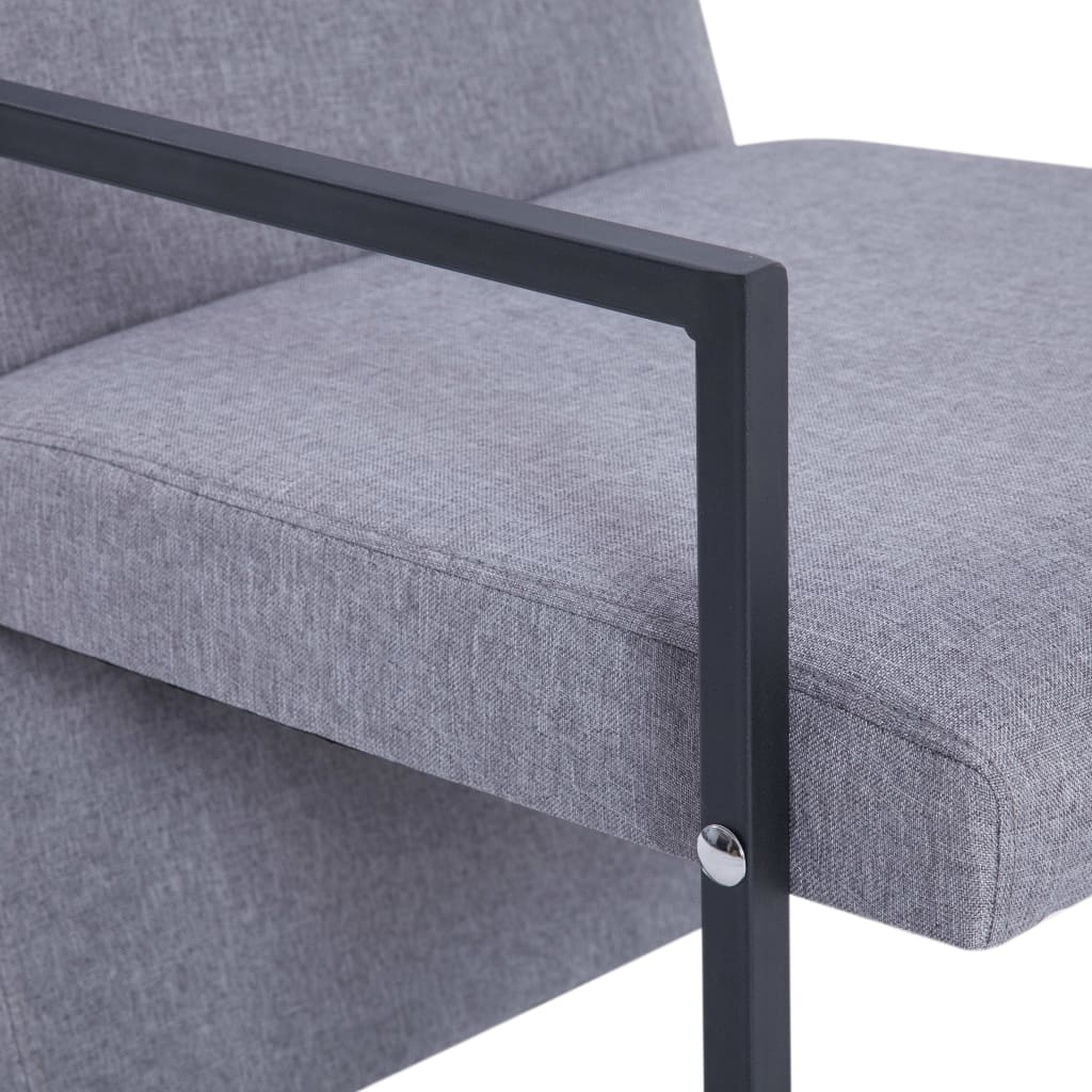Fauteuil en tissu gris clair