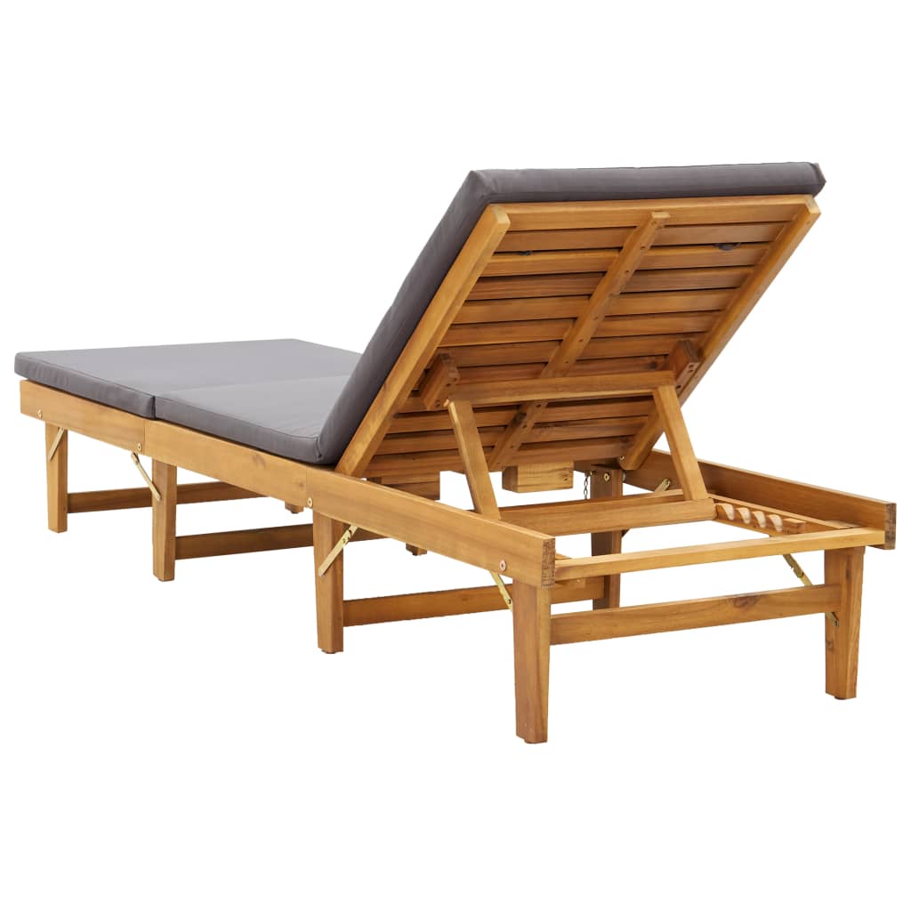 Folding sun lounger with cushion made of solid acacia wood