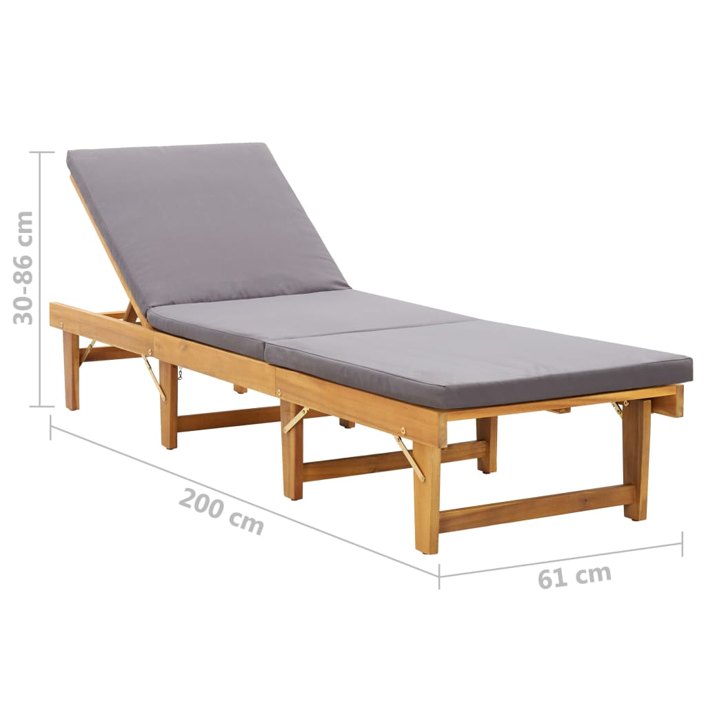 Folding sun lounger with cushion made of solid acacia wood