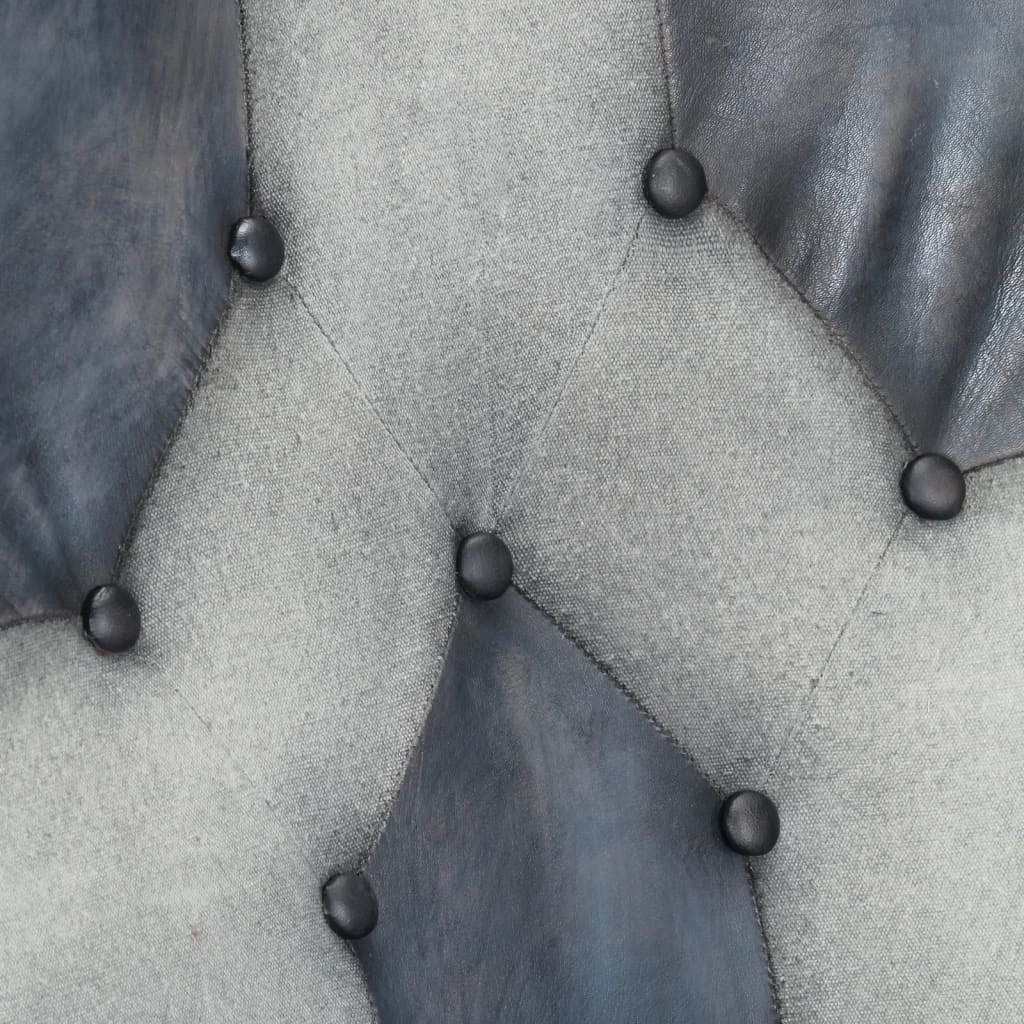 Fauteuil à oreilles en cuir véritable gris