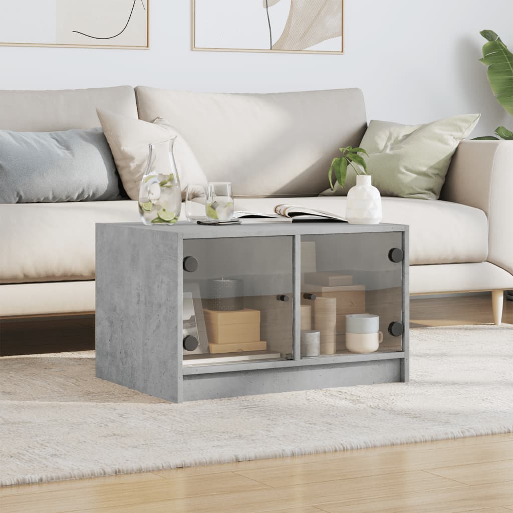 Table basse avec portes vitrées gris béton 68x50x42 cm