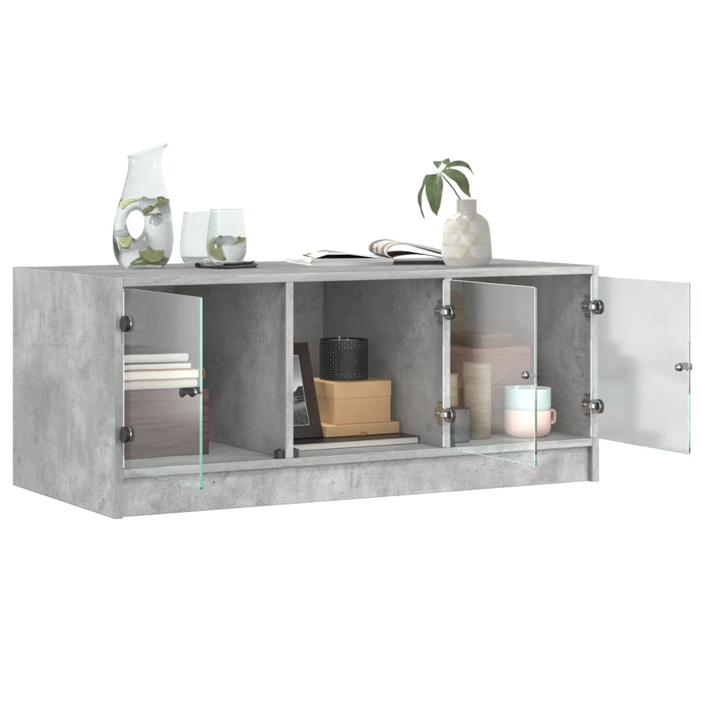 Table basse avec portes vitrées gris béton 102x50x42 cm
