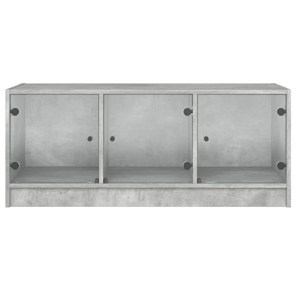 Table basse avec portes vitrées gris béton 102x50x42 cm