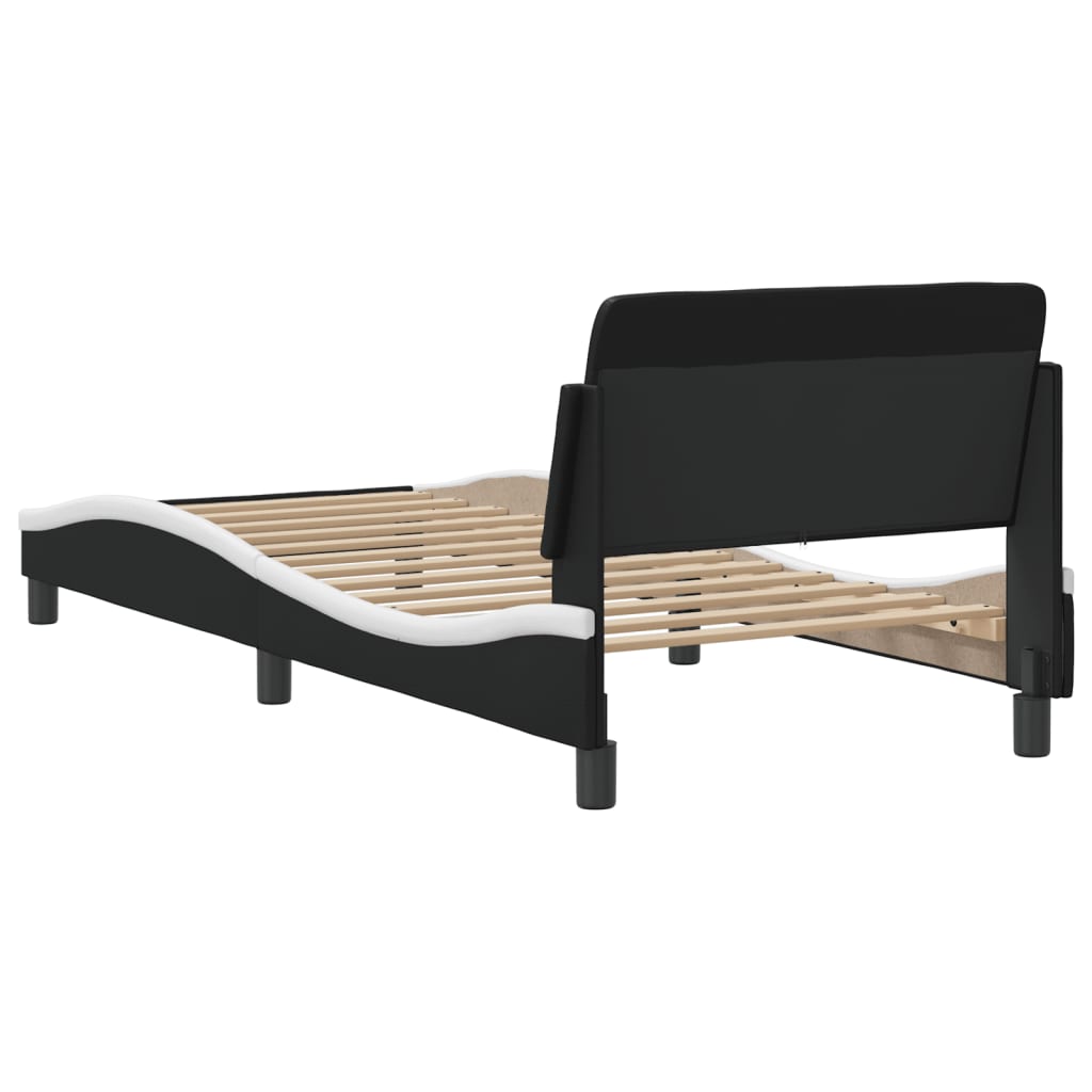 Bed frame with headboard black and white 90x190 cm artificial leather
