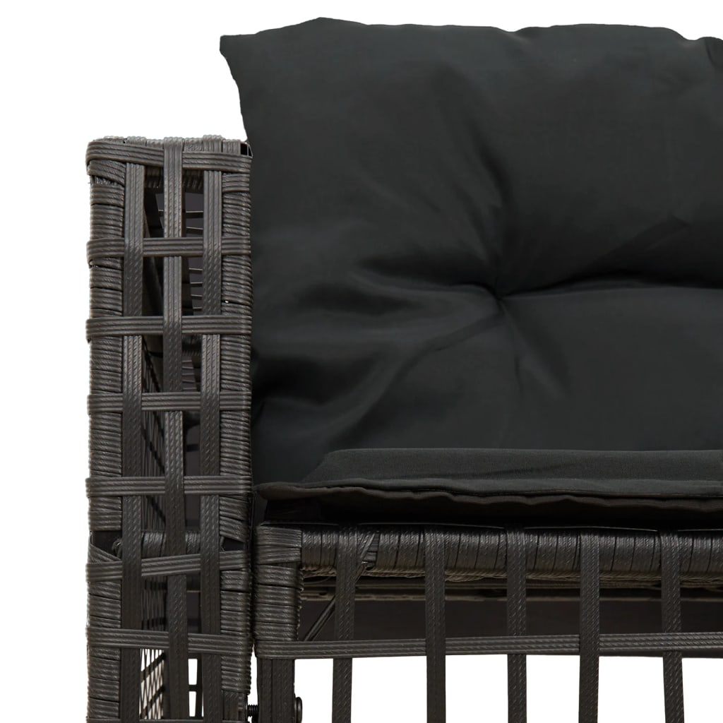 L-shaped garden sofa with cushions and footstool black poly rattan