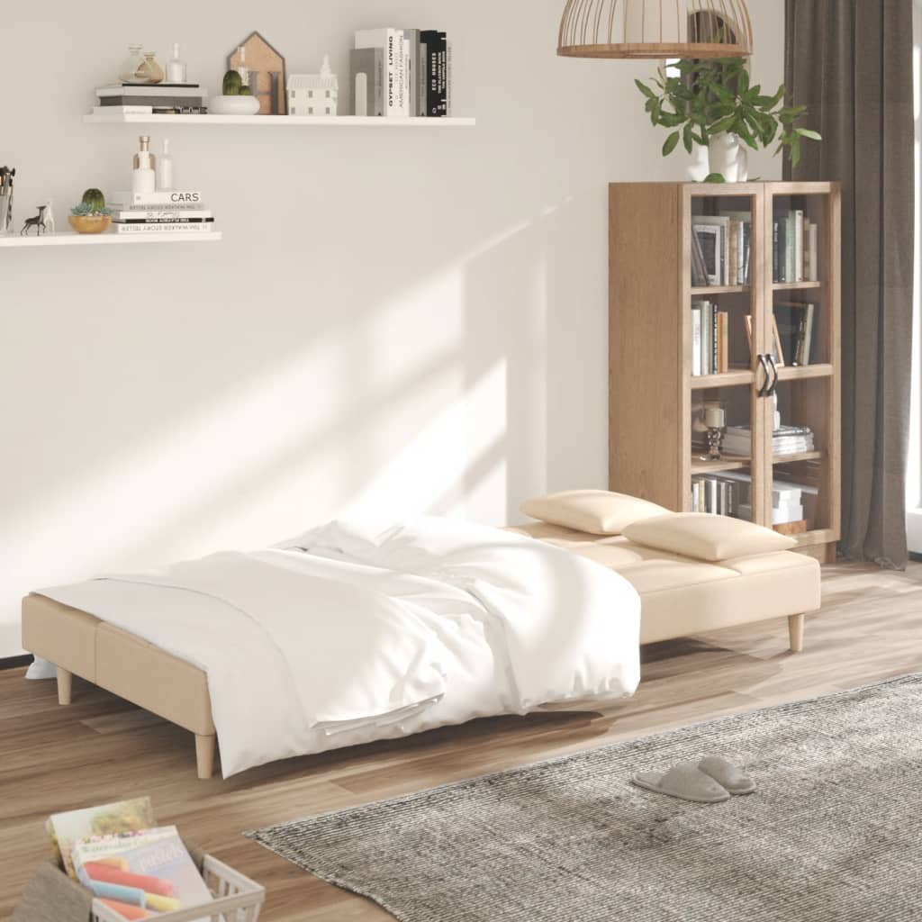 Canapé convertible 2 places avec 2 coussins en tissu crème