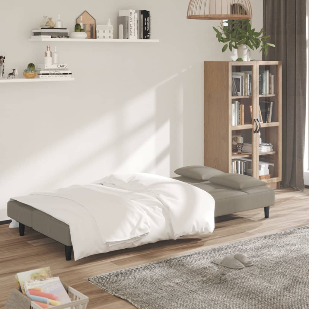 Canapé lit 2 places avec 2 coussins en velours gris clair