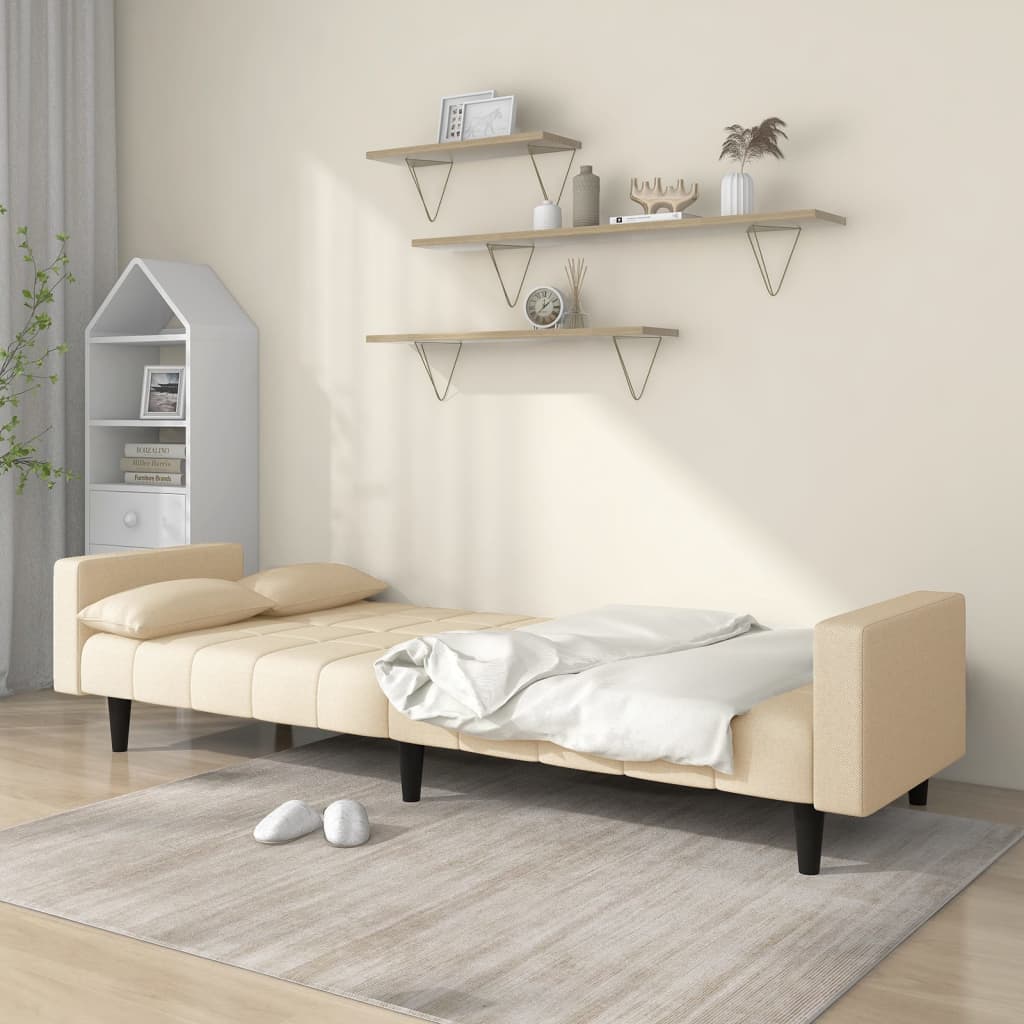Canapé convertible 2 places avec 2 coussins en tissu crème