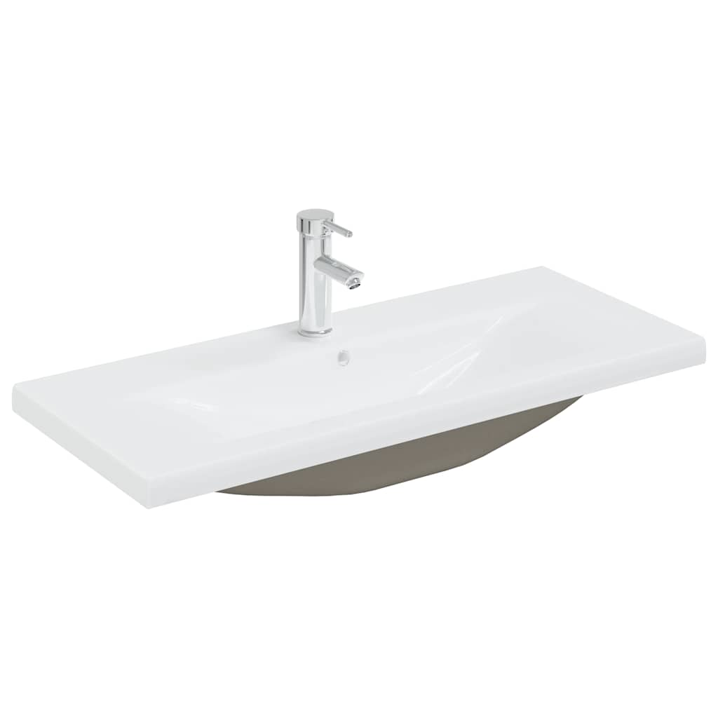 Vanity unit with built-in basin and faucet