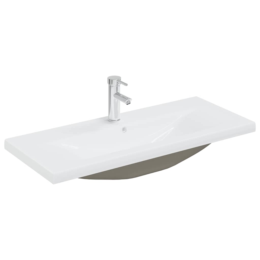 Vanity unit with built-in basin and faucet