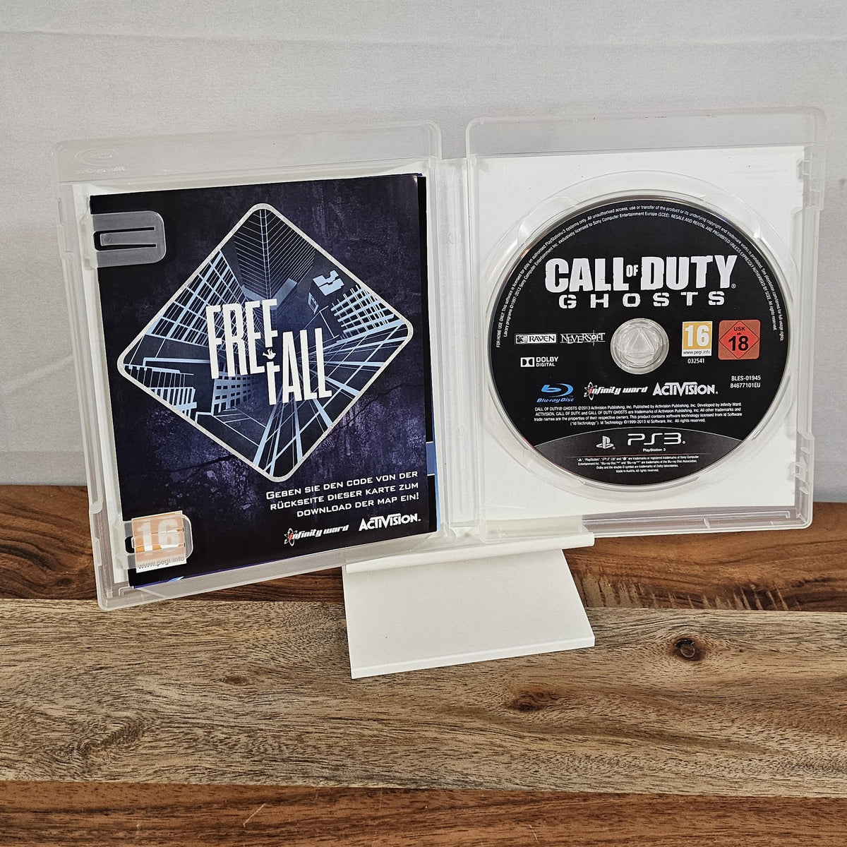 Call of Duty: Ghosts Limited Edition für PlayStation 3 – geöffnete Originalhülle mit Spiel-Disc und Bonusmap-Einleger