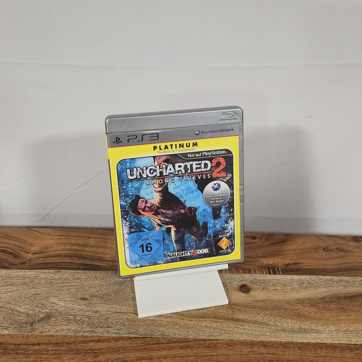 Uncharted 2: Among Thieves Platinum für PlayStation 3 – dieses USK-16-Exemplar in Originalhülle, Vorderseite
