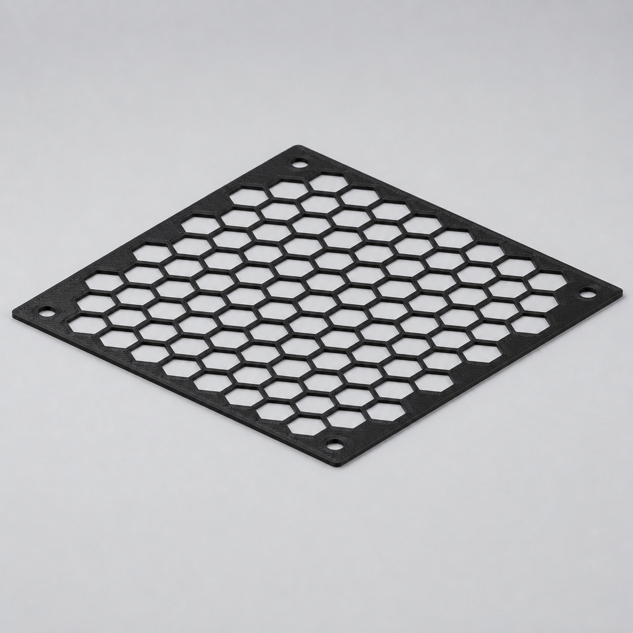 Schwarzes 120-mm-Lüfter-Schutzgitter aus dem 3D-Druck mit Honeycomb-Muster