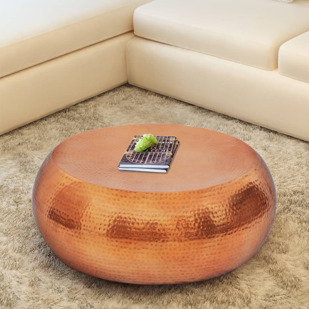 Coffee table made of hammered aluminum, copper-colored