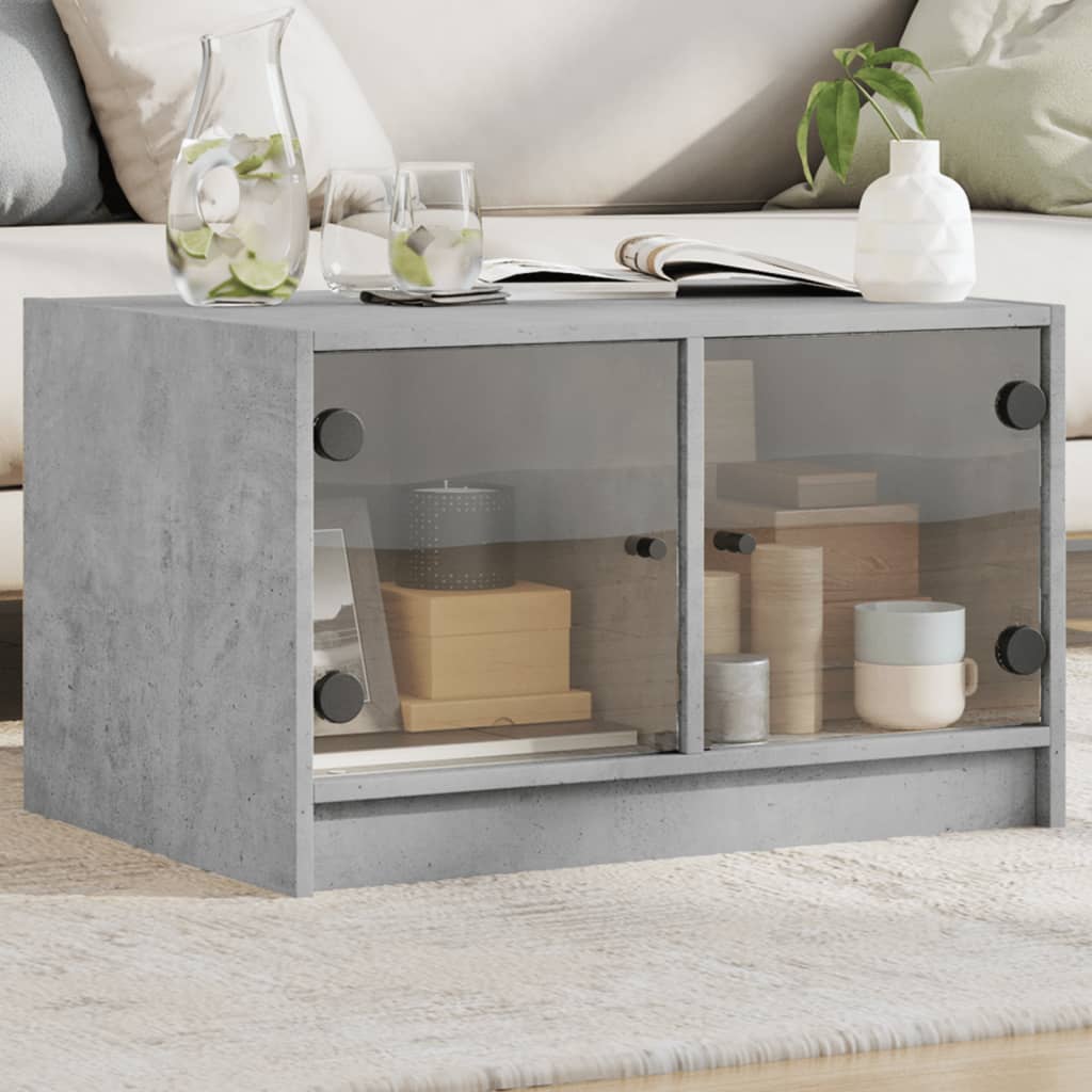 Table basse avec portes vitrées gris béton 68x50x42 cm