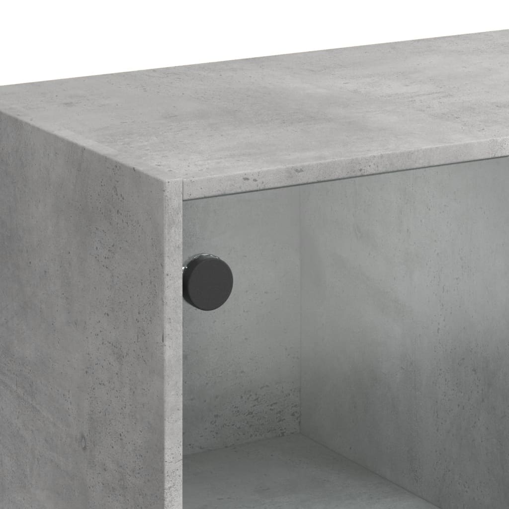 Table basse avec portes vitrées gris béton 102x50x42 cm