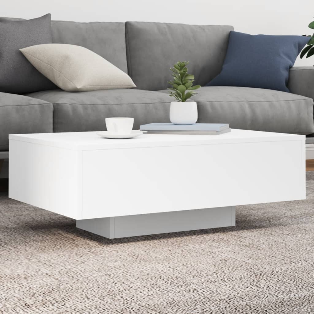 Coffee table with LED lights White 85x55x31 cm