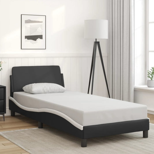 Bed frame with headboard black and white 90x200 cm artificial leather