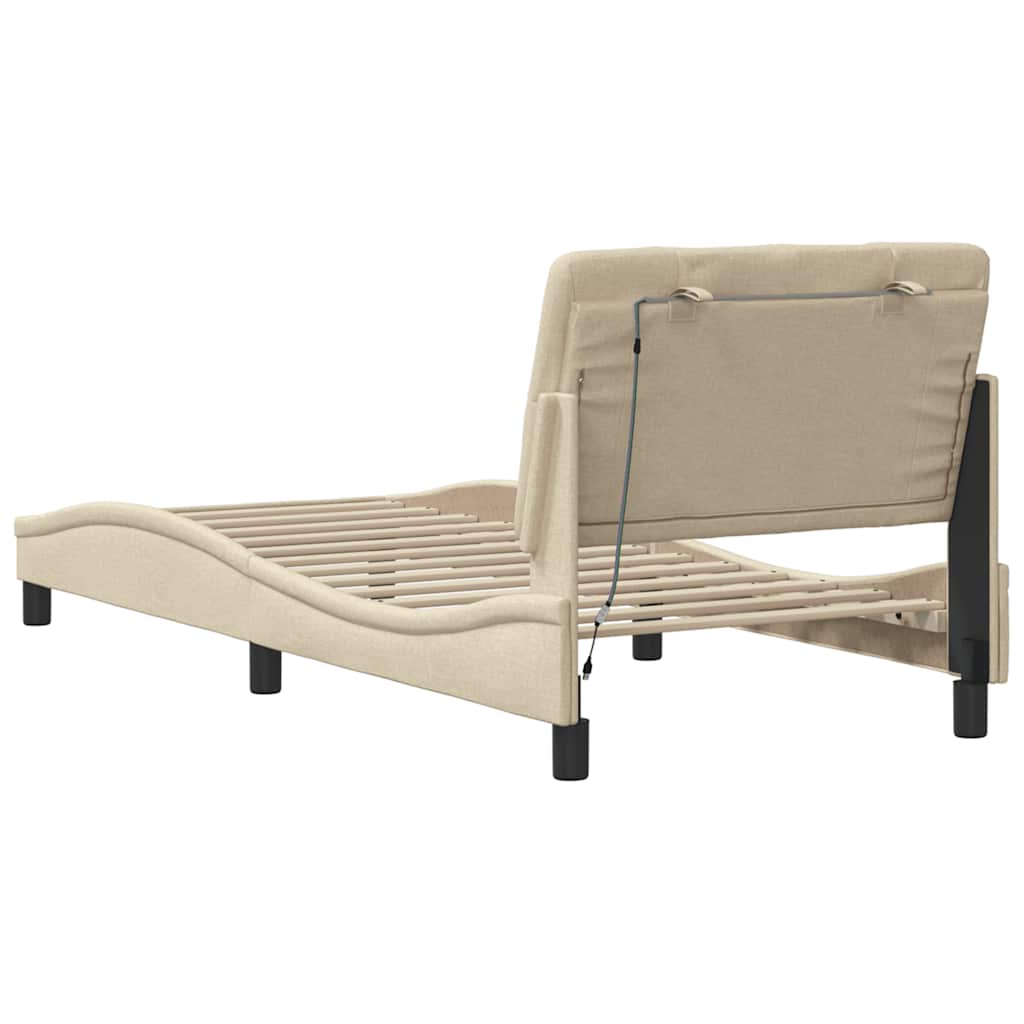 Cadre de lit avec LED sans matelas crème 90x190 cm tissu