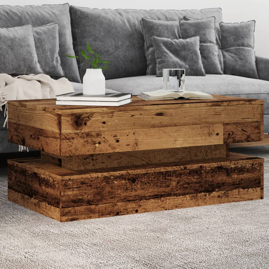 Coffee table with LED lights old wood look 90x50x40 cm