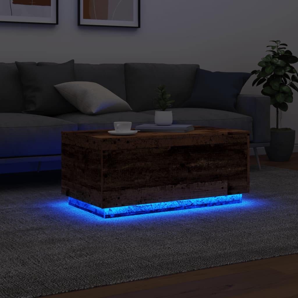 Coffee table with LED lights old wood look 90x50x40 cm