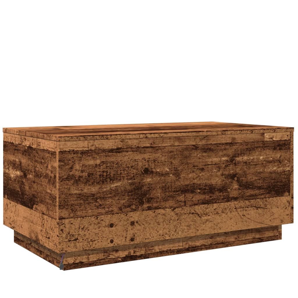 Coffee table with LED lights old wood look 90x50x40 cm