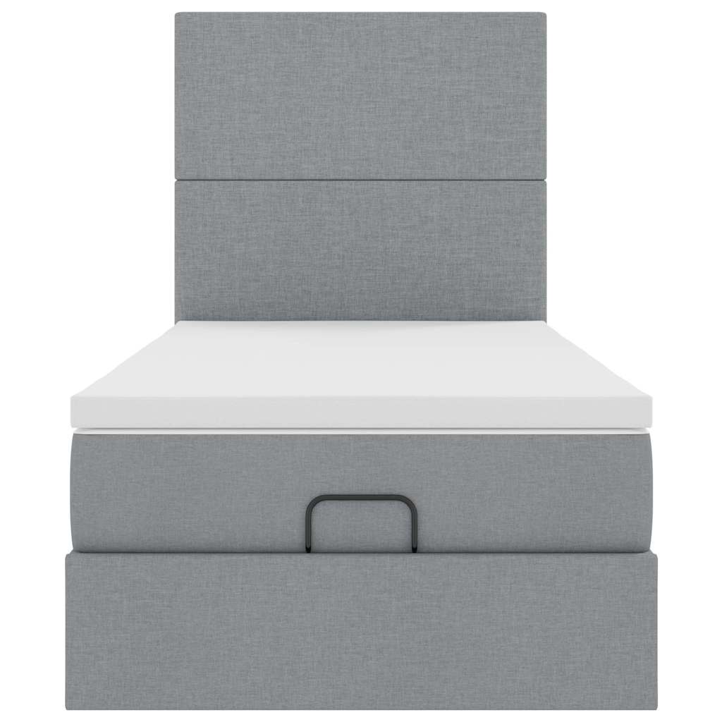 Lit ottoman avec matelas et LED gris clair 100x200 cm tissu
