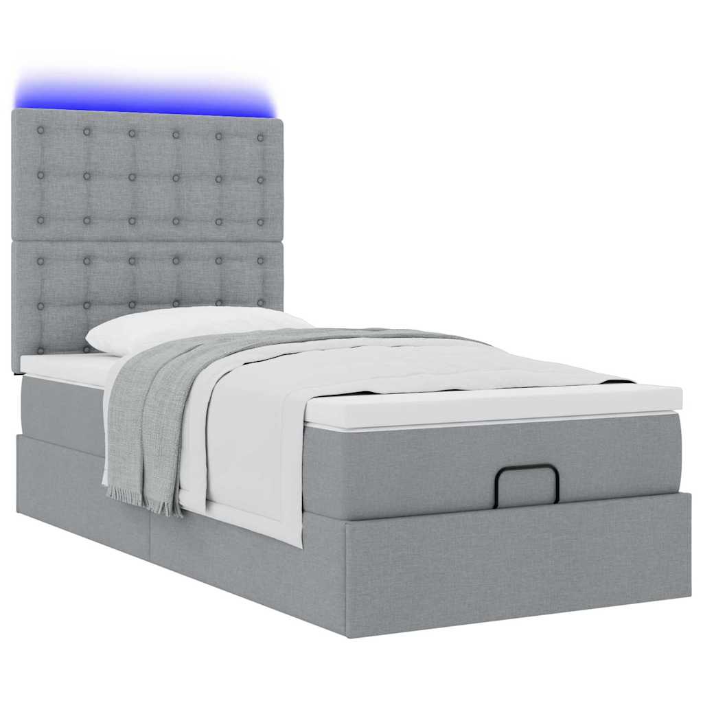 Lit ottoman avec matelas et LED gris clair 100x200 cm tissu