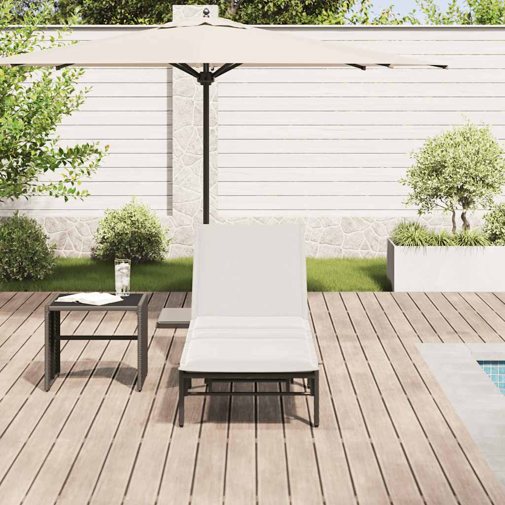 Bain de soleil avec coussin en polyrotin noir