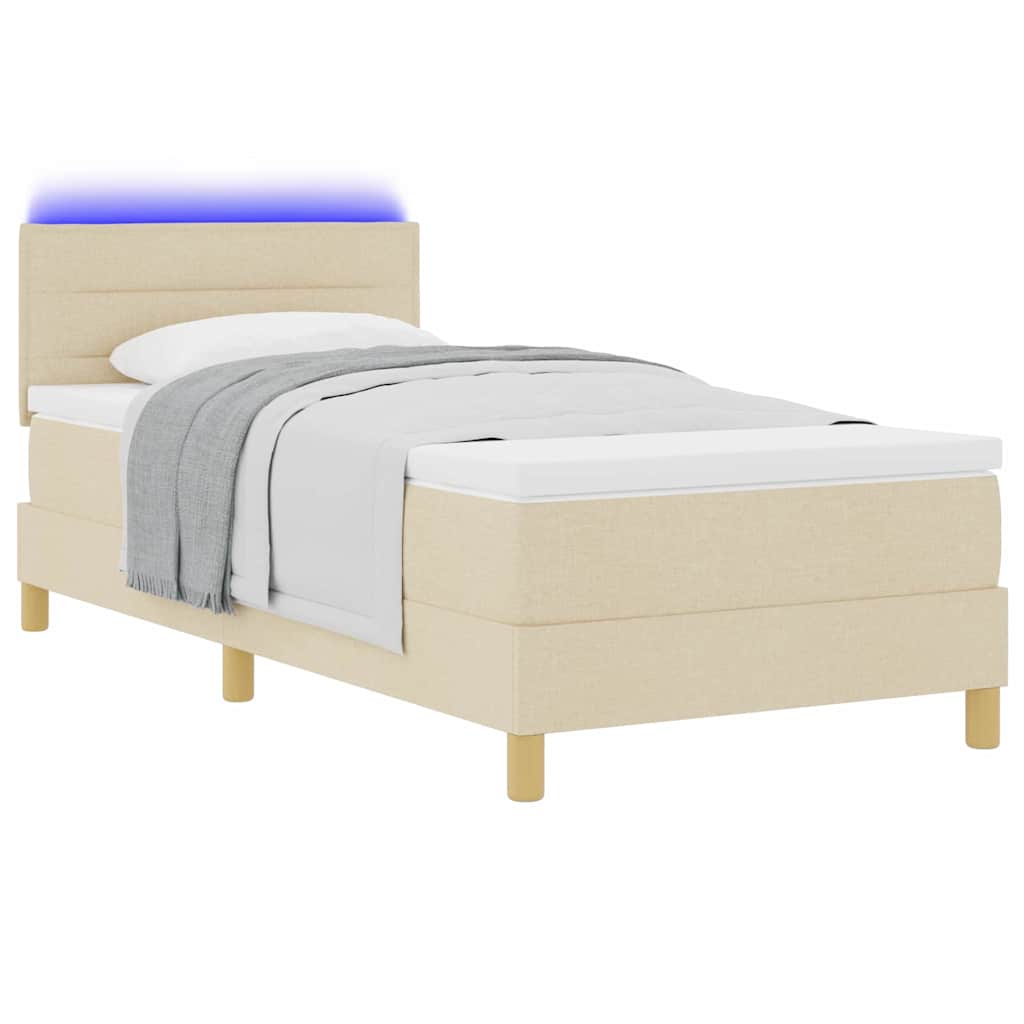 LED Boxspringbett mit LED-Lichtleisten Creme 90 x 190 cm Stoff