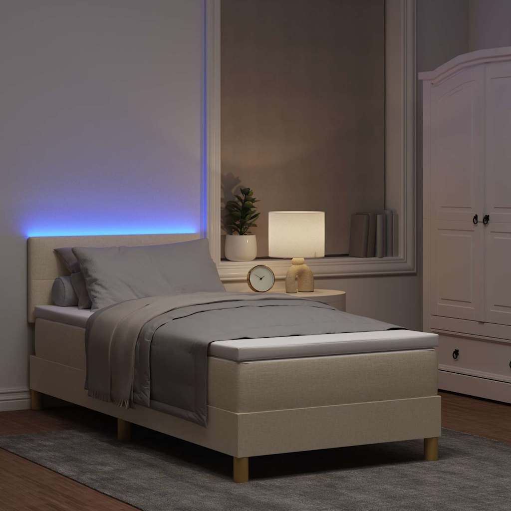 LED Boxspringbett mit LED-Lichtleisten Creme 90 x 190 cm Stoff