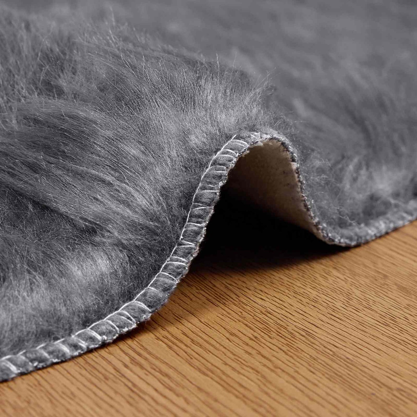 Teppich aus Kunstschaffell TAFALLA Anthrazit Ø 160 cm Polyester