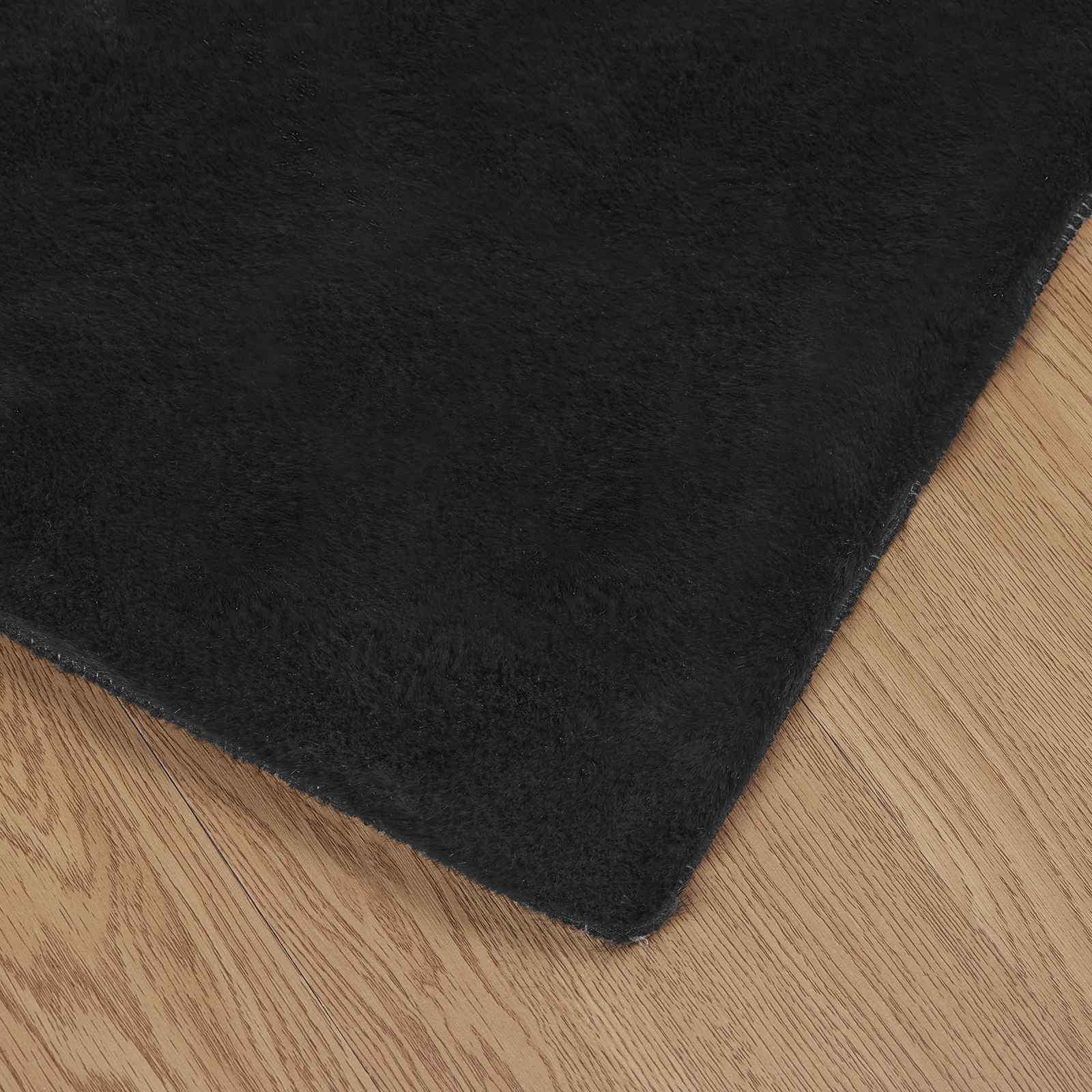 Rutschfester Teppich aus Kunstkaninchenfell OLITE Schwarz