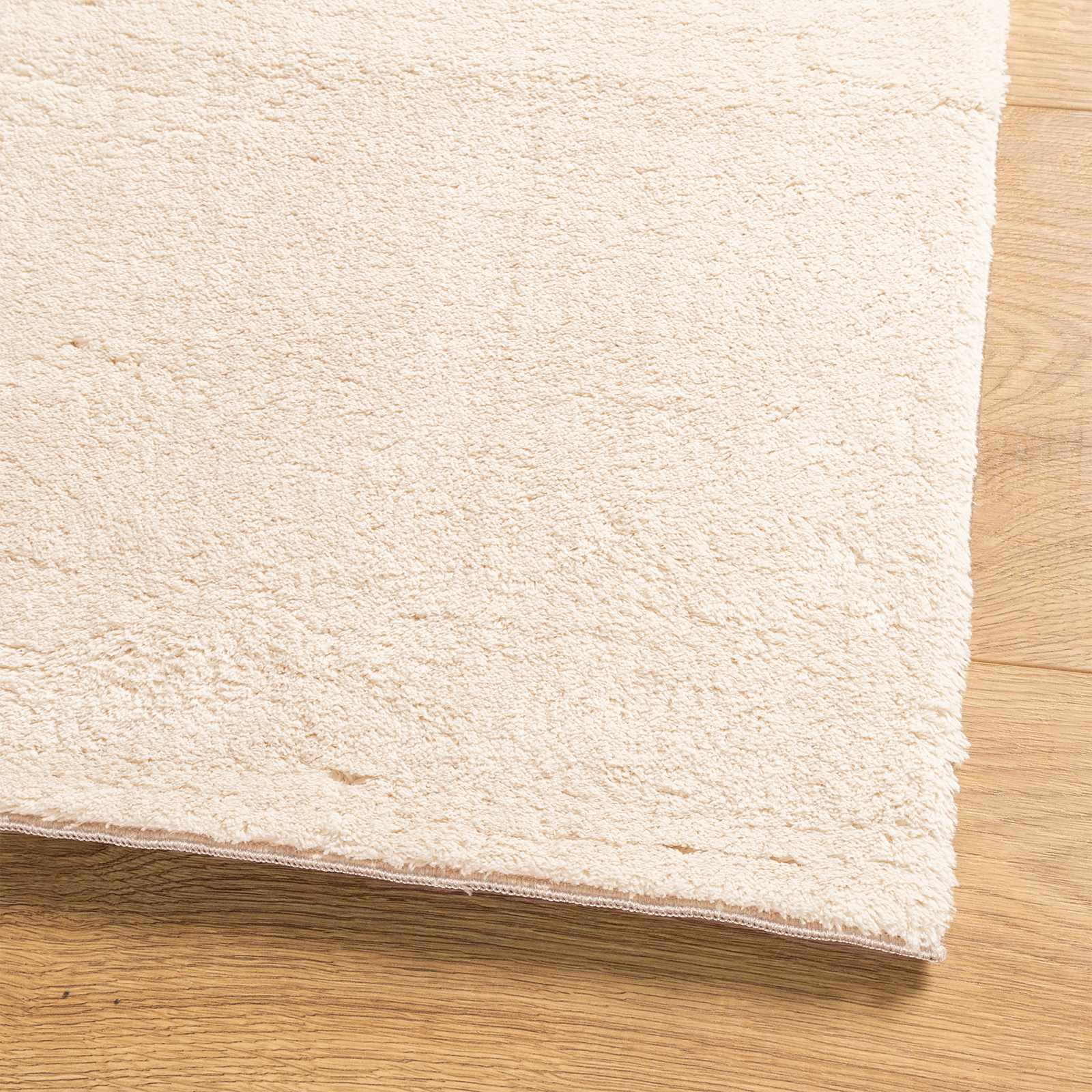 Mittlerer Flor weicher und waschbarer Teppich HUARTE Beige