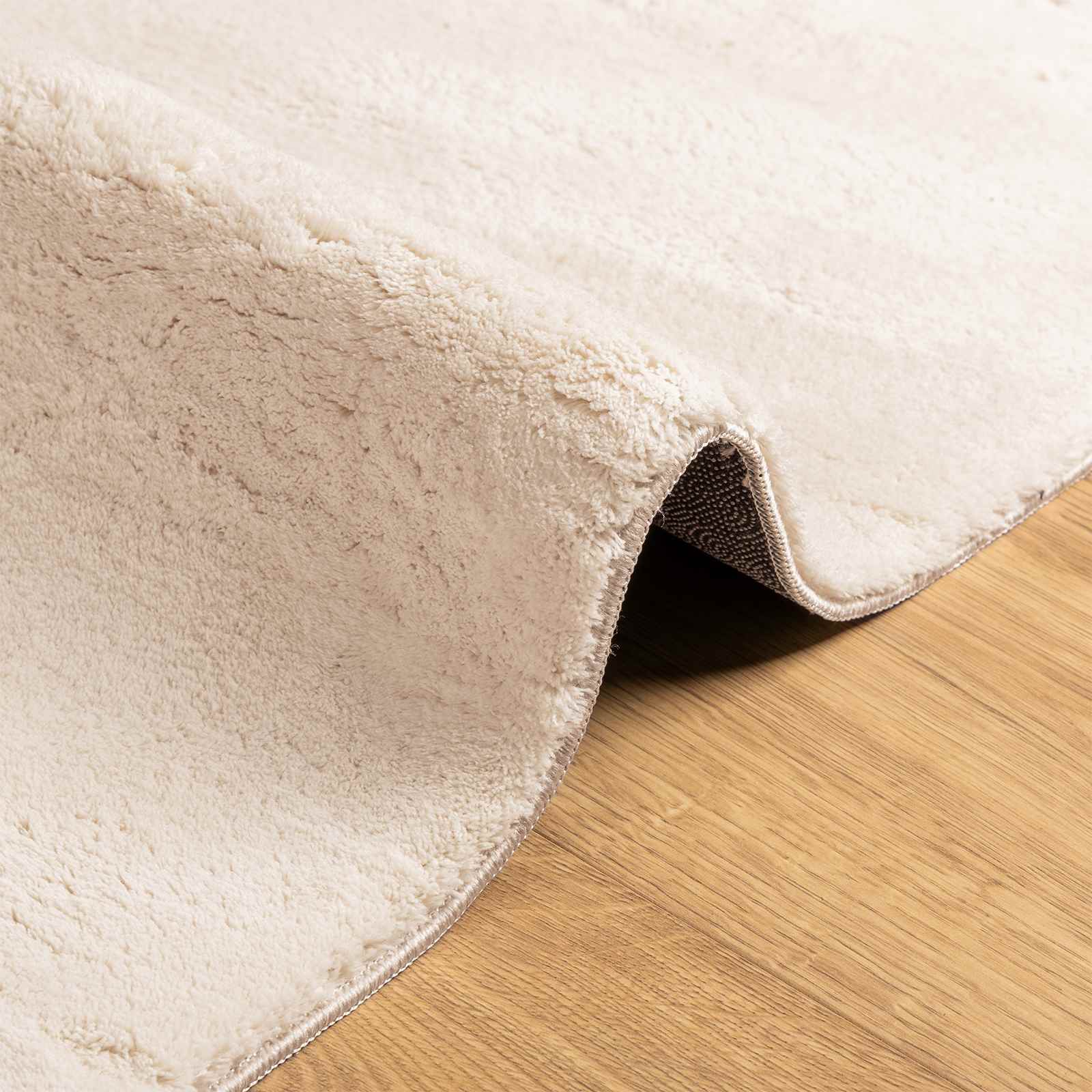 Mittlerer Flor weicher und waschbarer Teppich HUARTE Beige