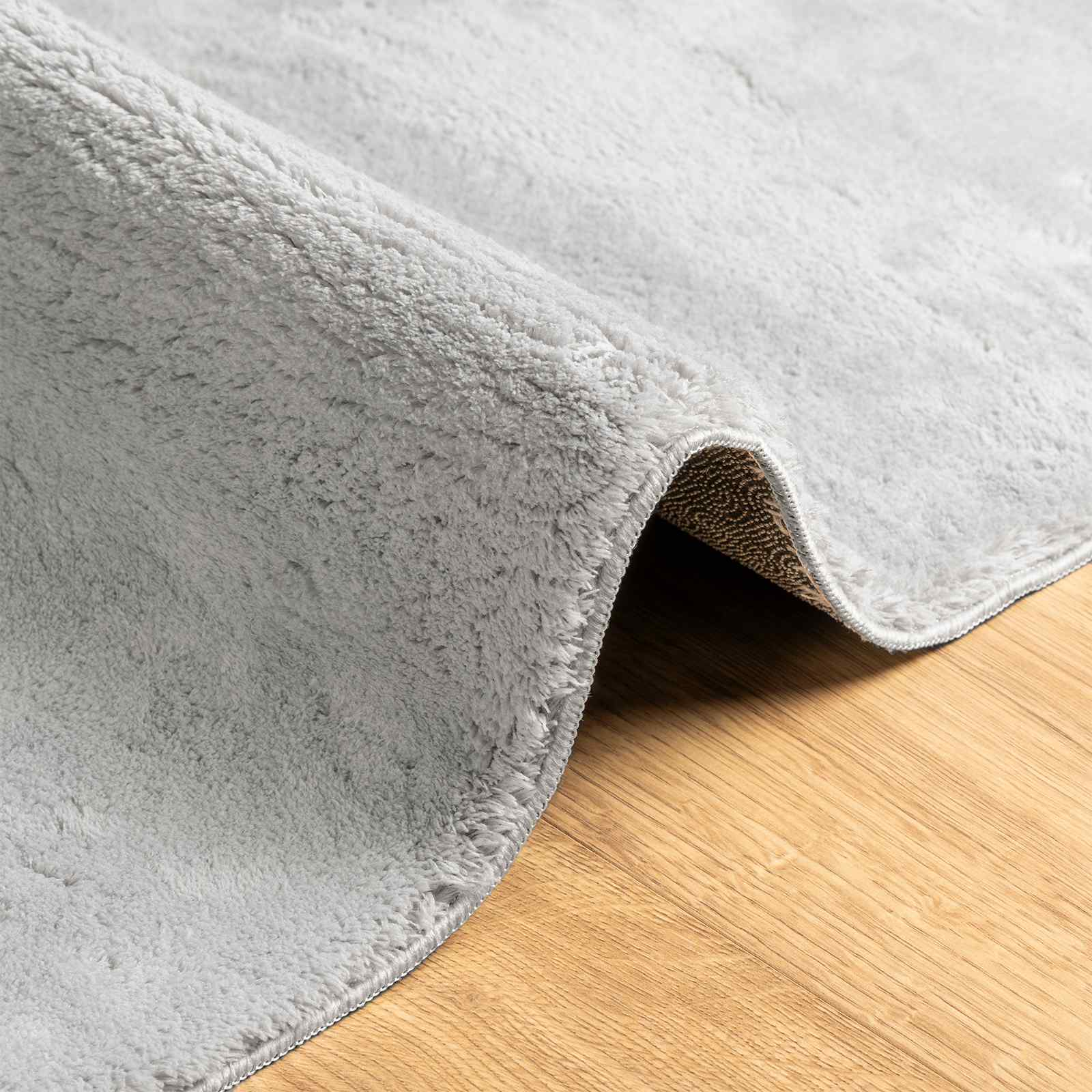 Mittlerer Flor weicher und waschbarer Teppich HUARTE Grau