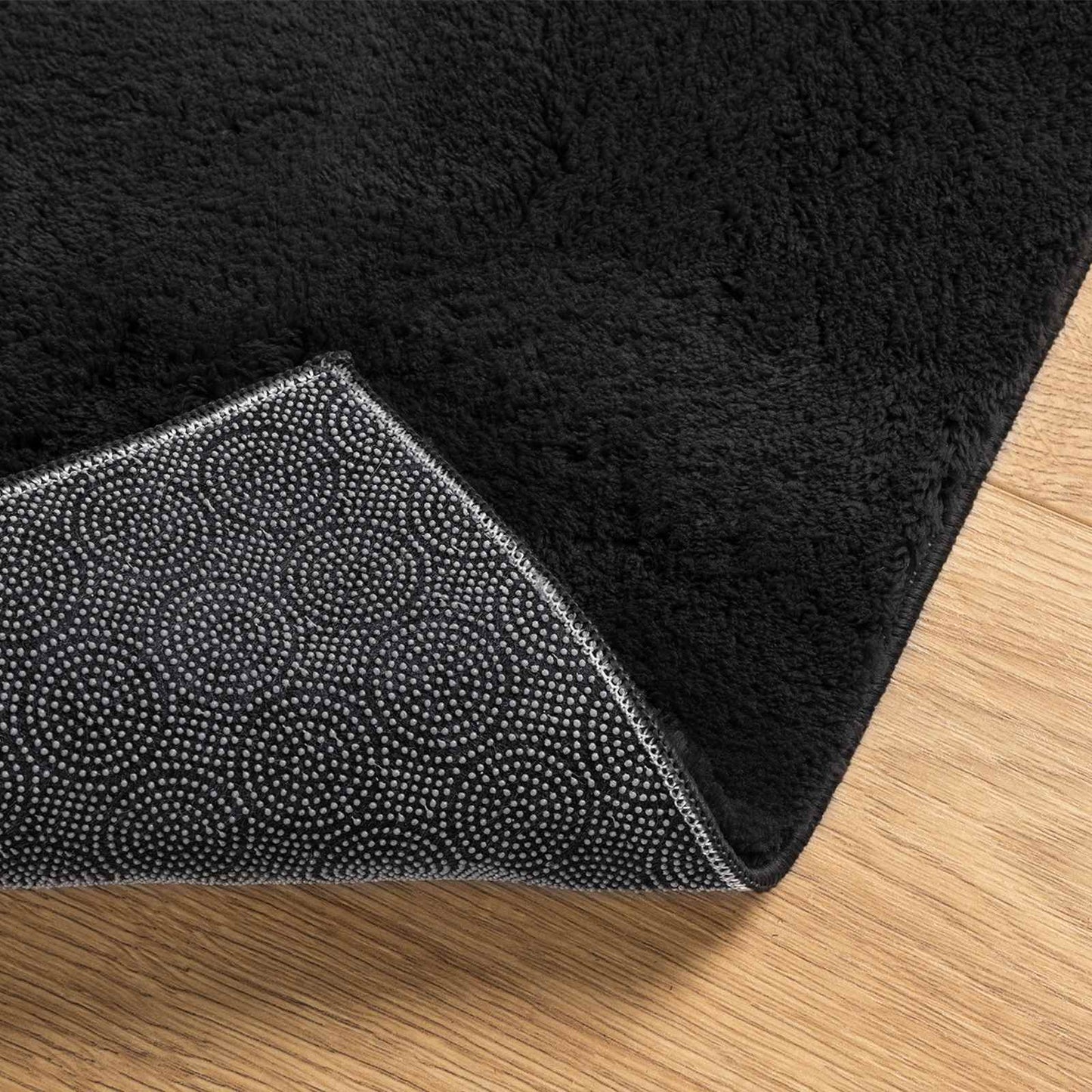 Mittlerer Flor weicher und waschbarer Teppich HUARTE Schwarz