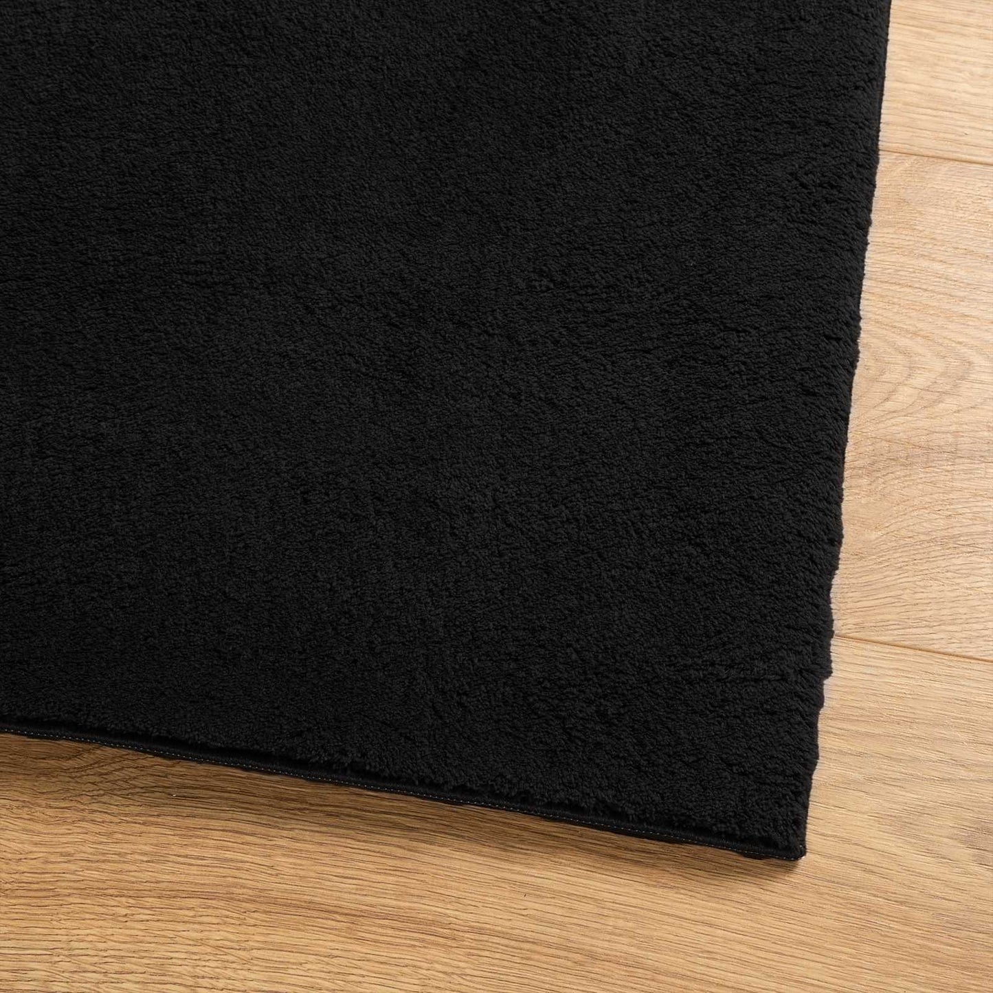 Mittlerer Flor weicher und waschbarer Teppich HUARTE Schwarz