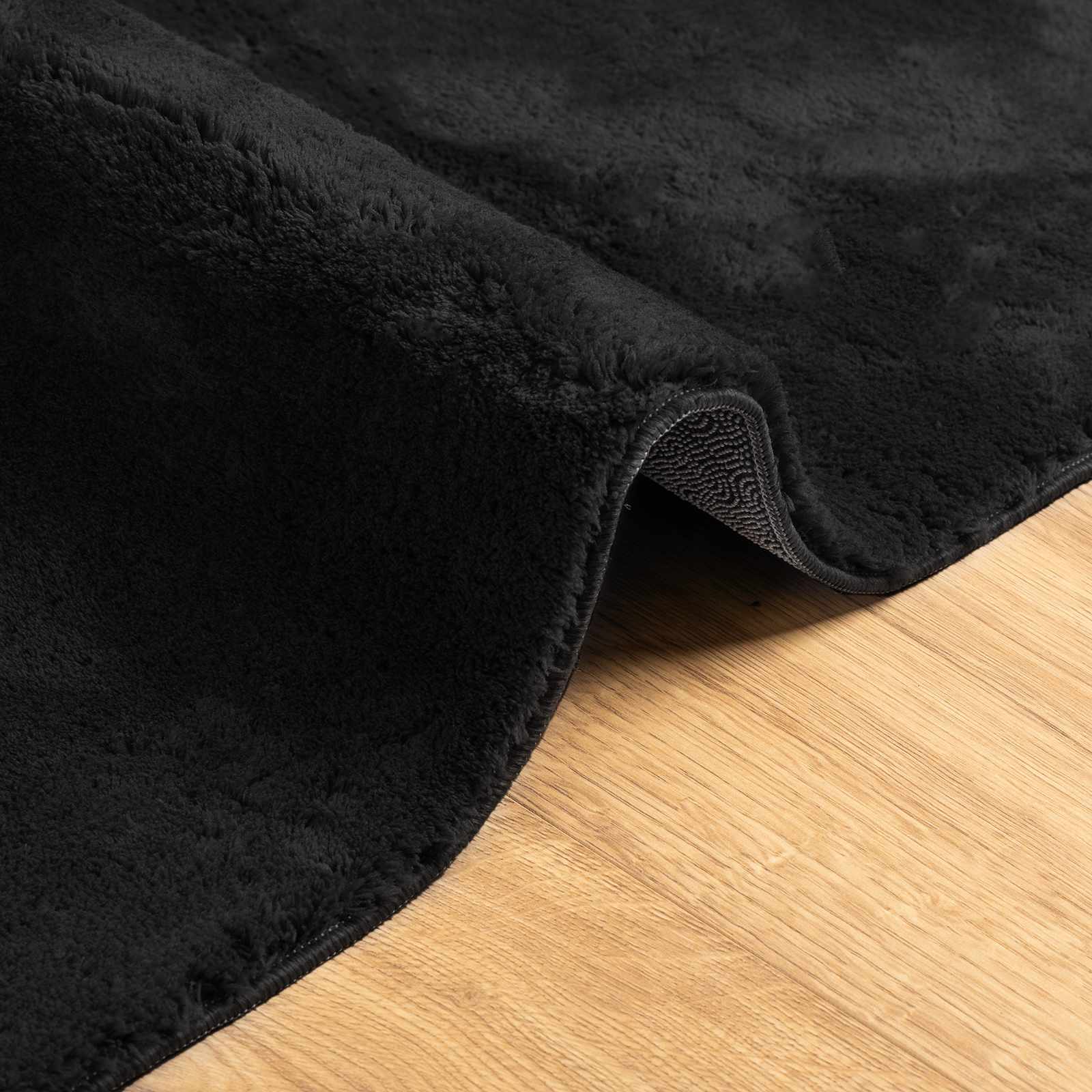 Mittlerer Flor weicher und waschbarer Teppich HUARTE Schwarz