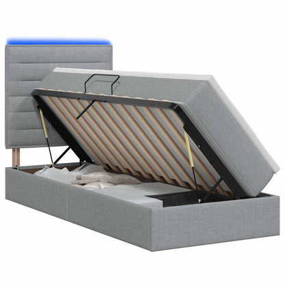LED-Speicherbett mit Matratze Hellgrau 90 x 200 cm Stoff